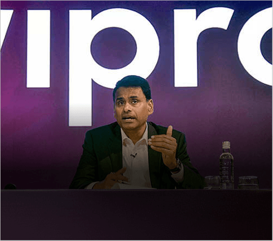 Speaker presenting at Wipro event